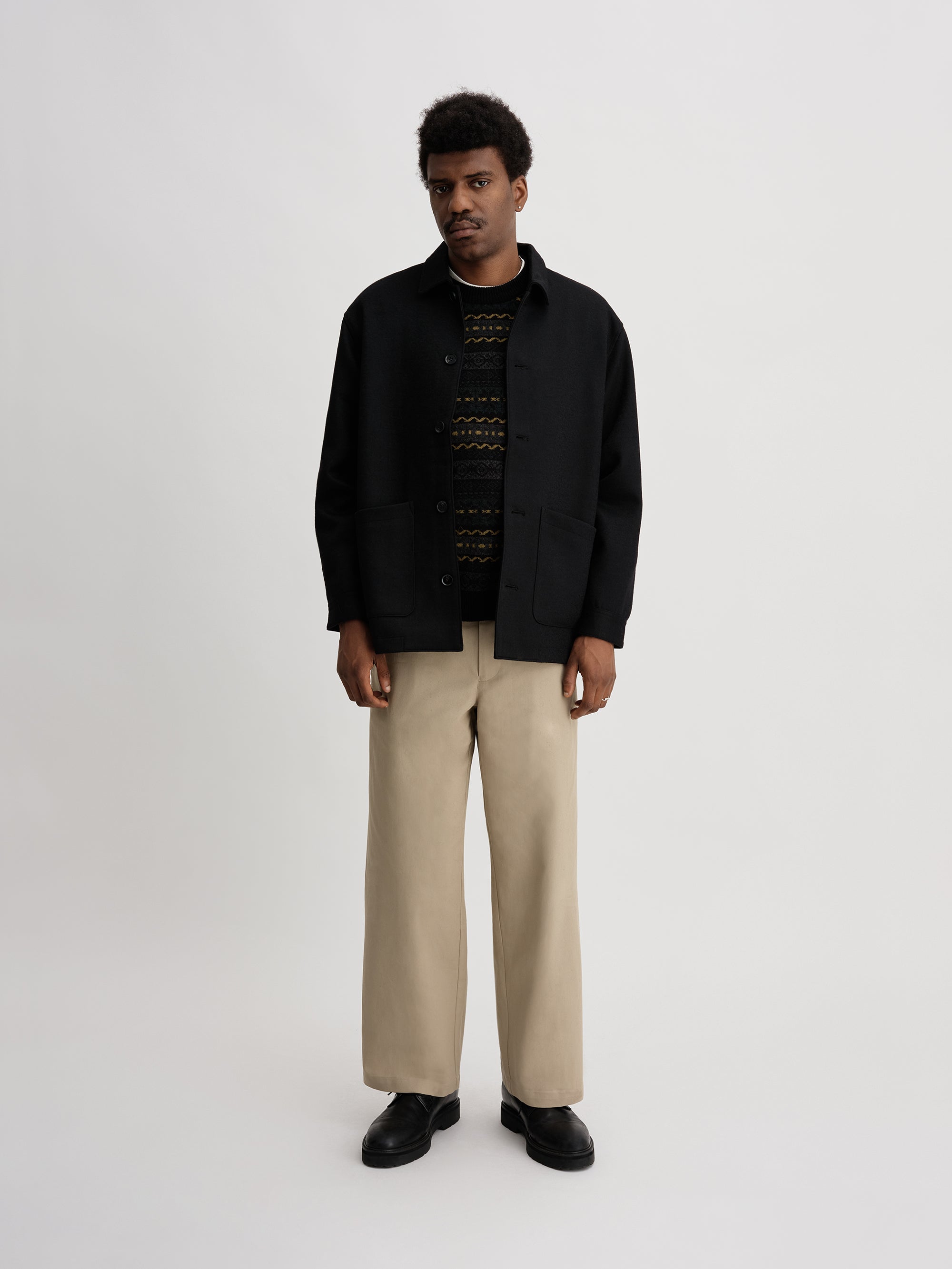 Model in a black overshirt
